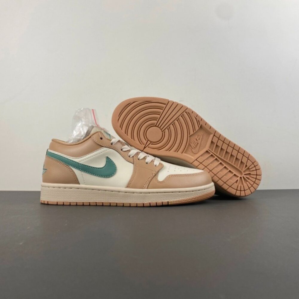 Air Jordan 1 Low Sneakers With A Tan And White Color Scheme